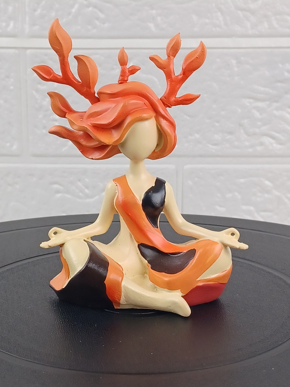 Meditative Goddess Figurine in Orange and Cream Resin